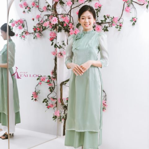 Áo dài bưng quả xanh hoa