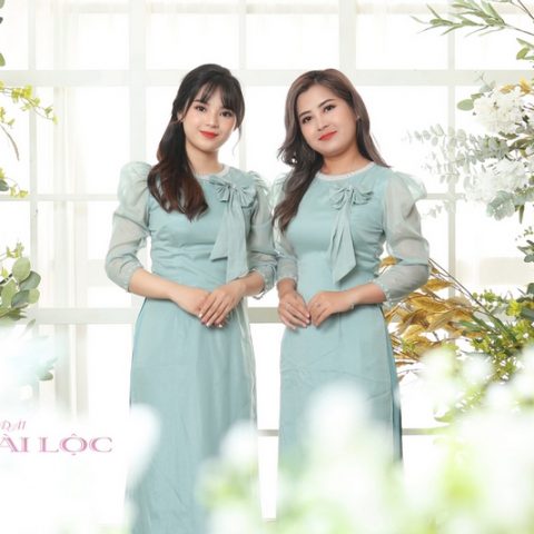 Áo dài bưng quả xanh nơ không cổ